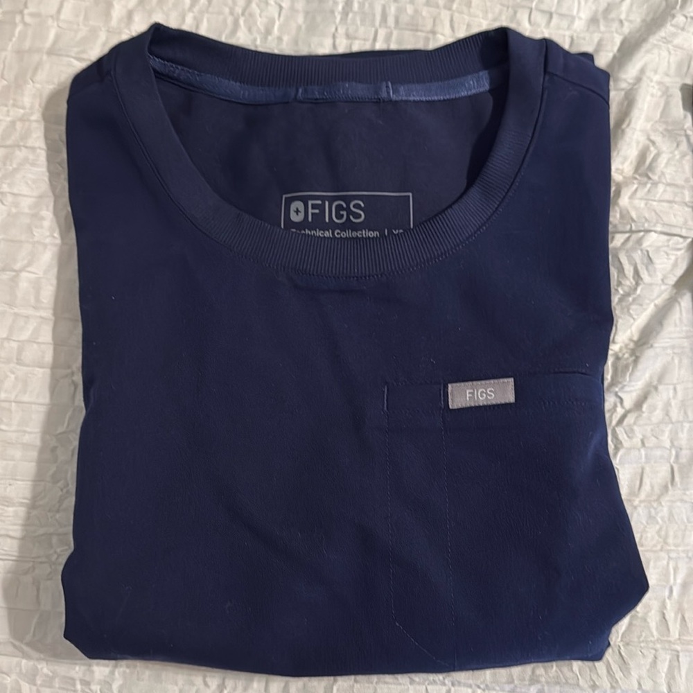 Navy figs scrub top. Women’s XS. Tshirt neckline.
